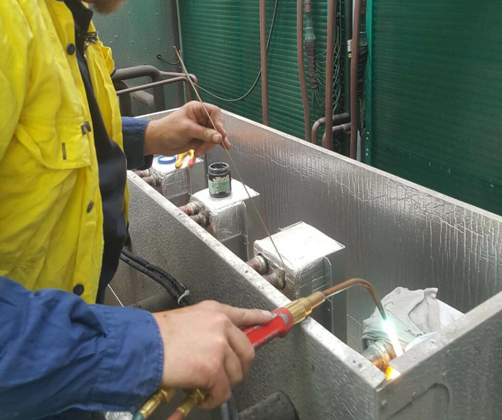 Man repairing a chiller