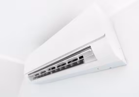 Accent air conditioner on a wall in white background
