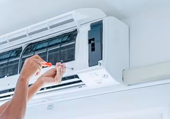 An air conditioner being repaired